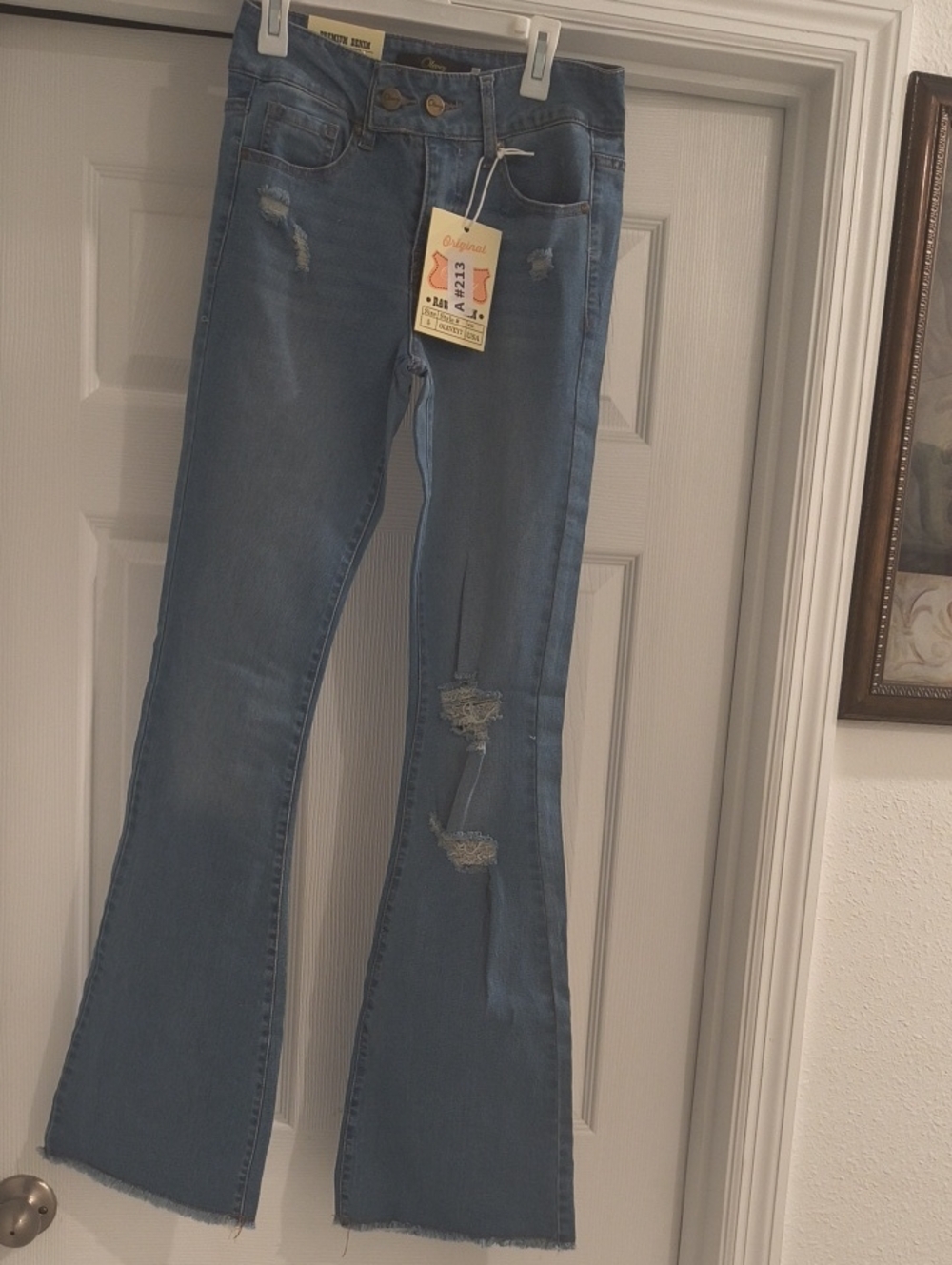 Mid-Wash Distressed Flare Jeans for Women Size 5